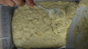 filling the batter into the baking dish