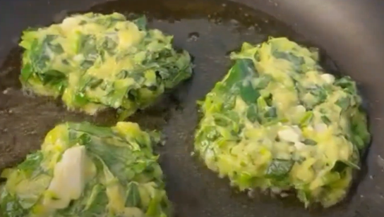 zucchini fritters in the frying pan