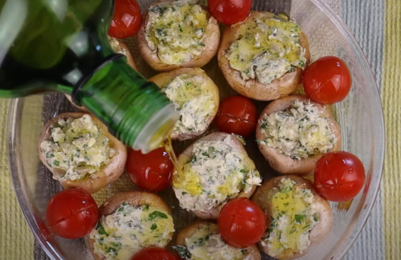 add cherry tomatoes and drizzle with olive oil