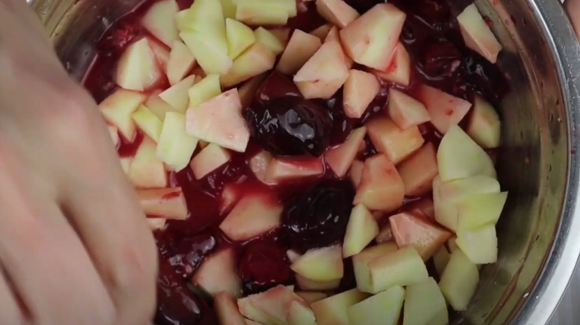 a mix of plums and apples