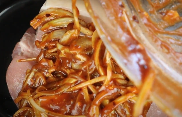 pork with the sauce before cooking