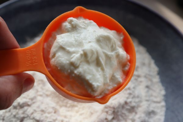 add yogurt to the flour