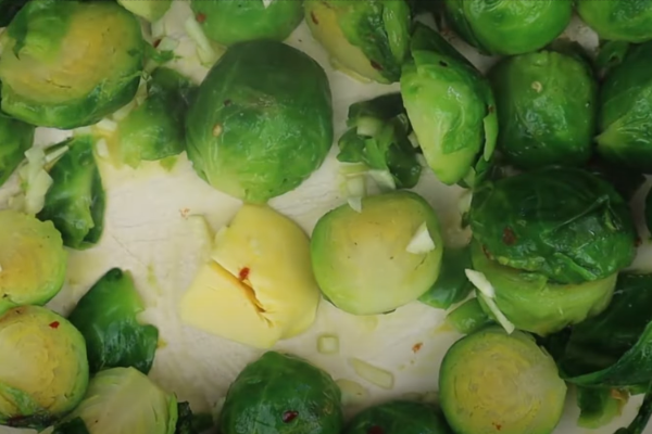 add butter and garlic to the sprouts